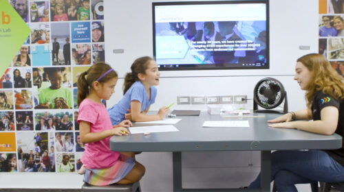 students in mobile stem lab with teacher