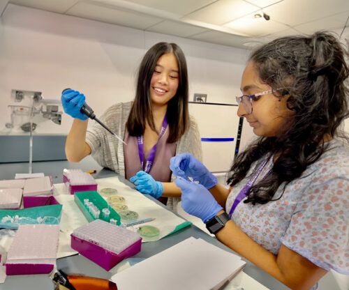 girls in biotechnology lab working