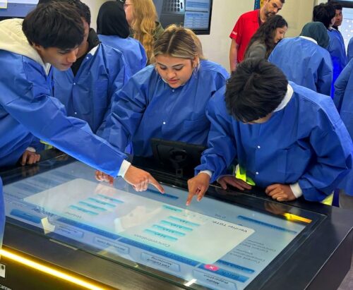 students in the Breakout Box playing the biomfg experience